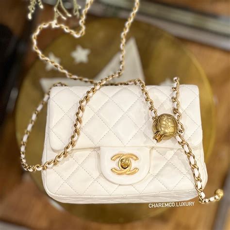 round puffball of white feathers chanel|fashionphile Chanel bags.